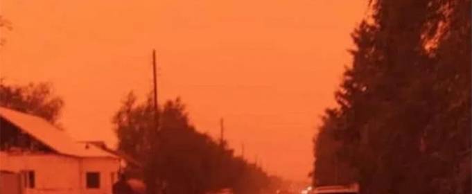 В Якутії дим від лісових пожеж повністю закрив сонце В Якутії дим від лісових пожеж повністю закрив сонце